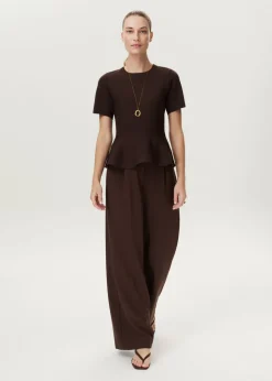 Peplum trui met ribstructuur